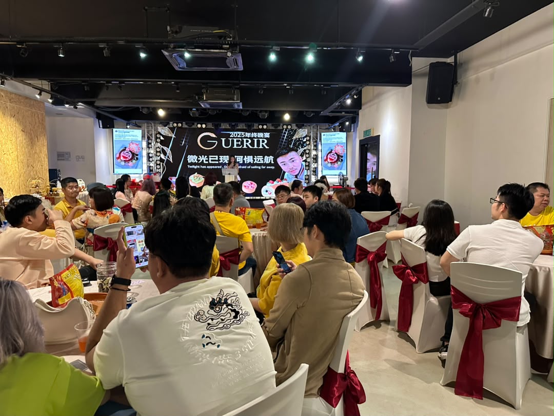 Year-end celebration dinner with decorated chairs and guests at Dreamlive Event Space Puchong