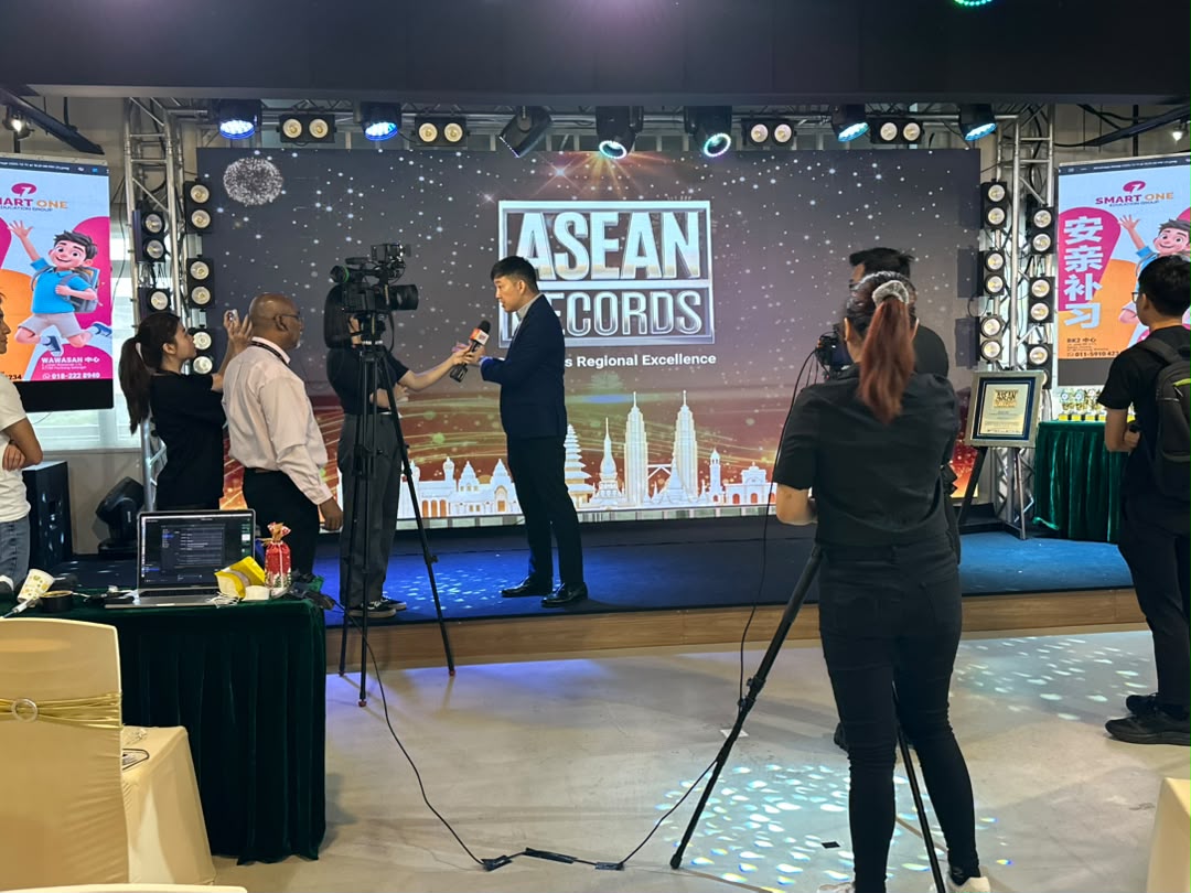 Award presentation with media interview on stage at Dreamlive Event Space Puchong